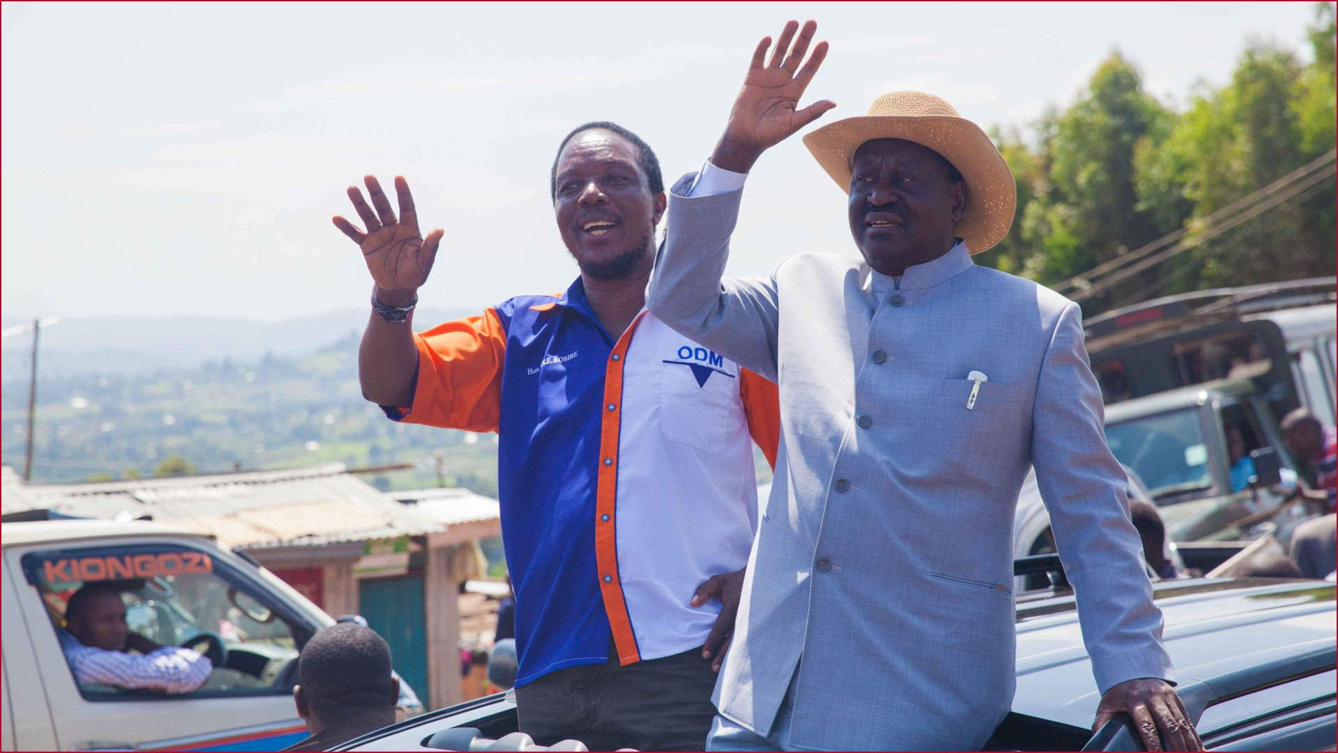 ODM national treasurer Timothy Bosire (l) with ODM party boss Raila Odinga in a past political rally.